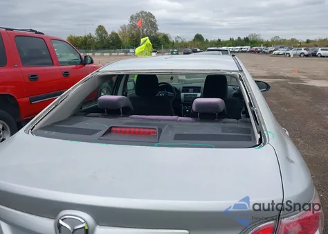 2009 Mazda Mazda6 I Touring z USA, uszkodzony, nr VIN 1YVHP82A695M00321